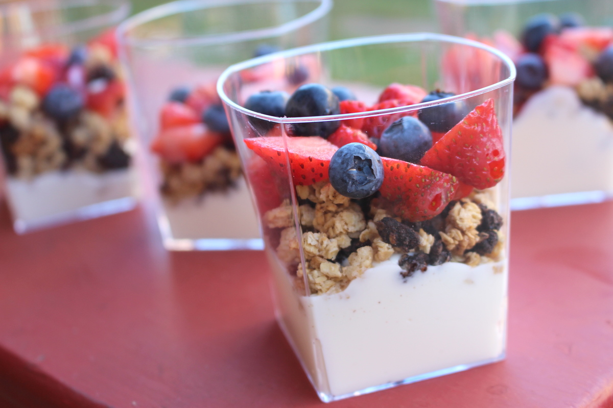 Image of a cup of greek yogurt parfait with oatmeal and fruit