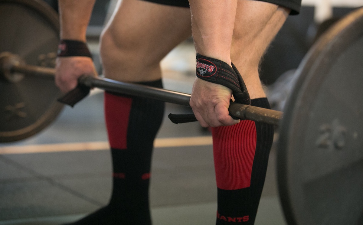 Image of a man preparing for a deadlift