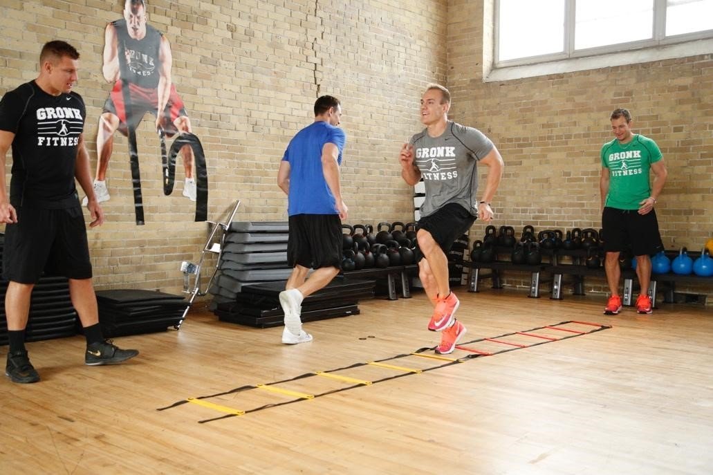 Chris Gronkowski warming up with rope ladder