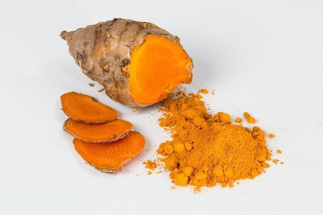 Turmeric root, whole and ground